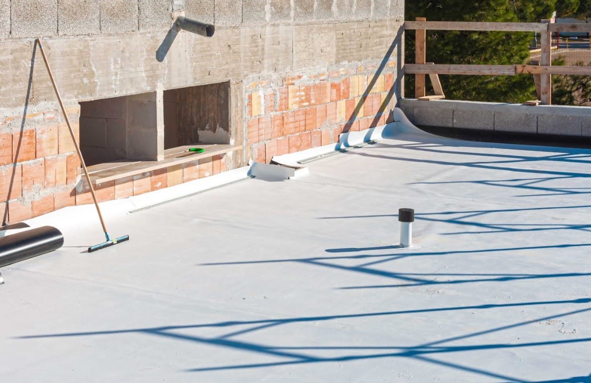 Commercial roof in a process of roof coating in Vero Beach, FL