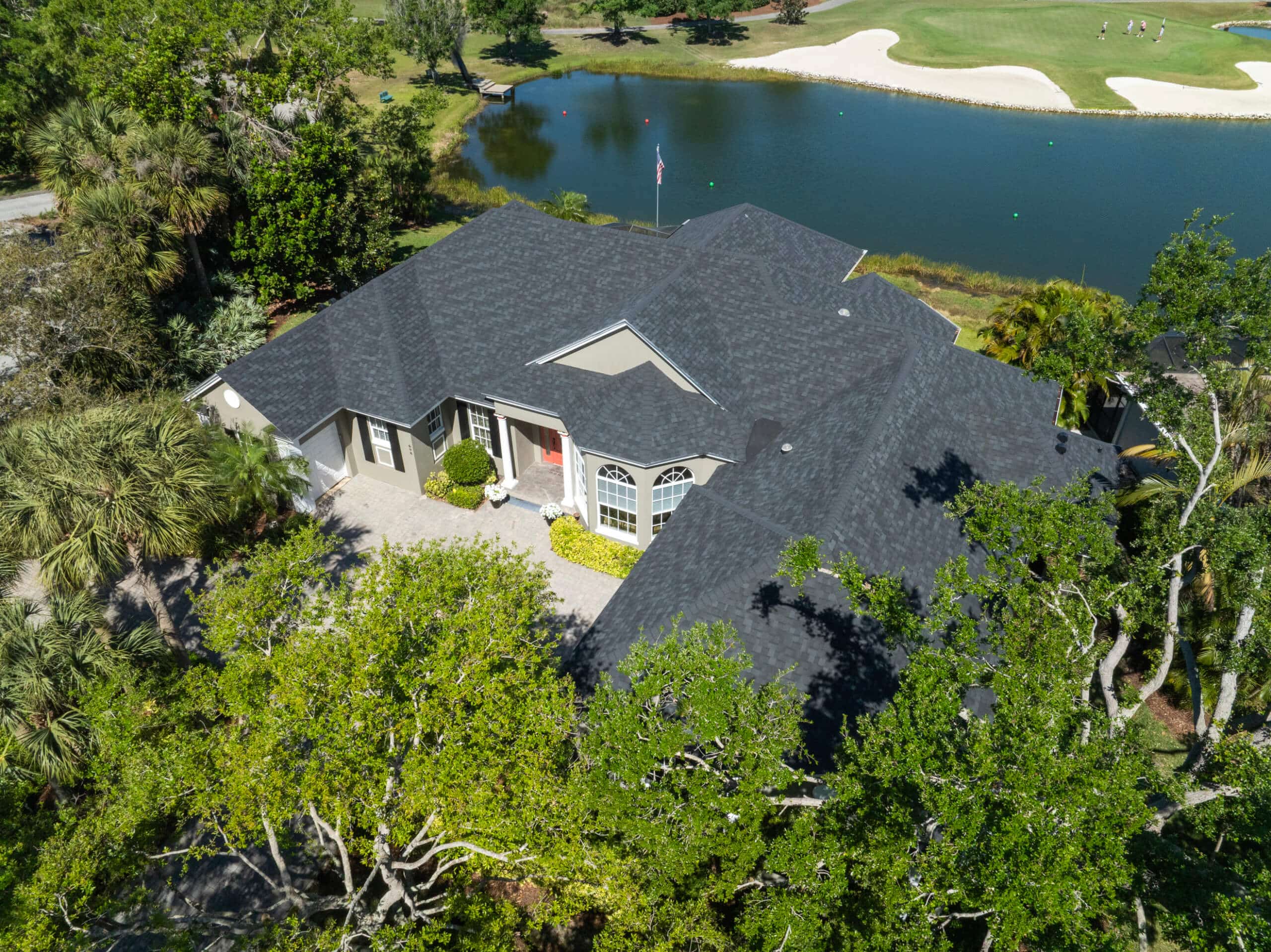 Recently installed black shingle rood in Vero Beach, FL