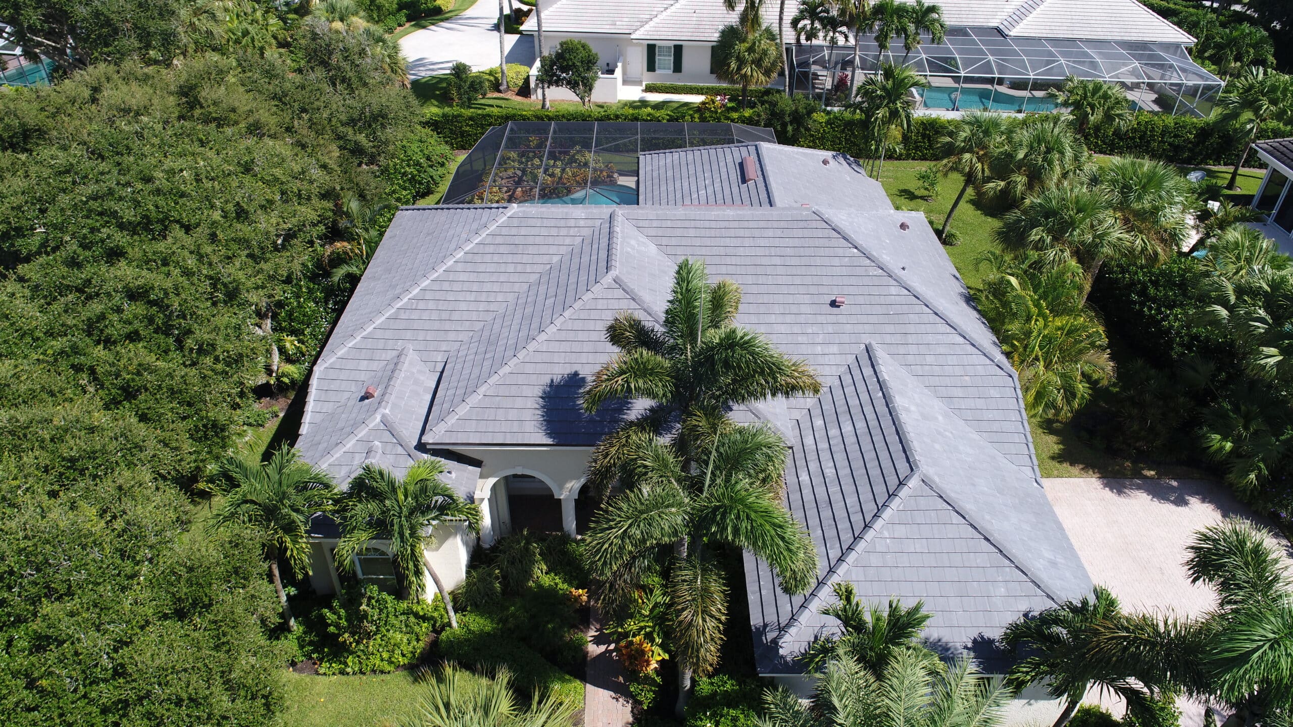 arial view of a gray tile roof after repair work completed