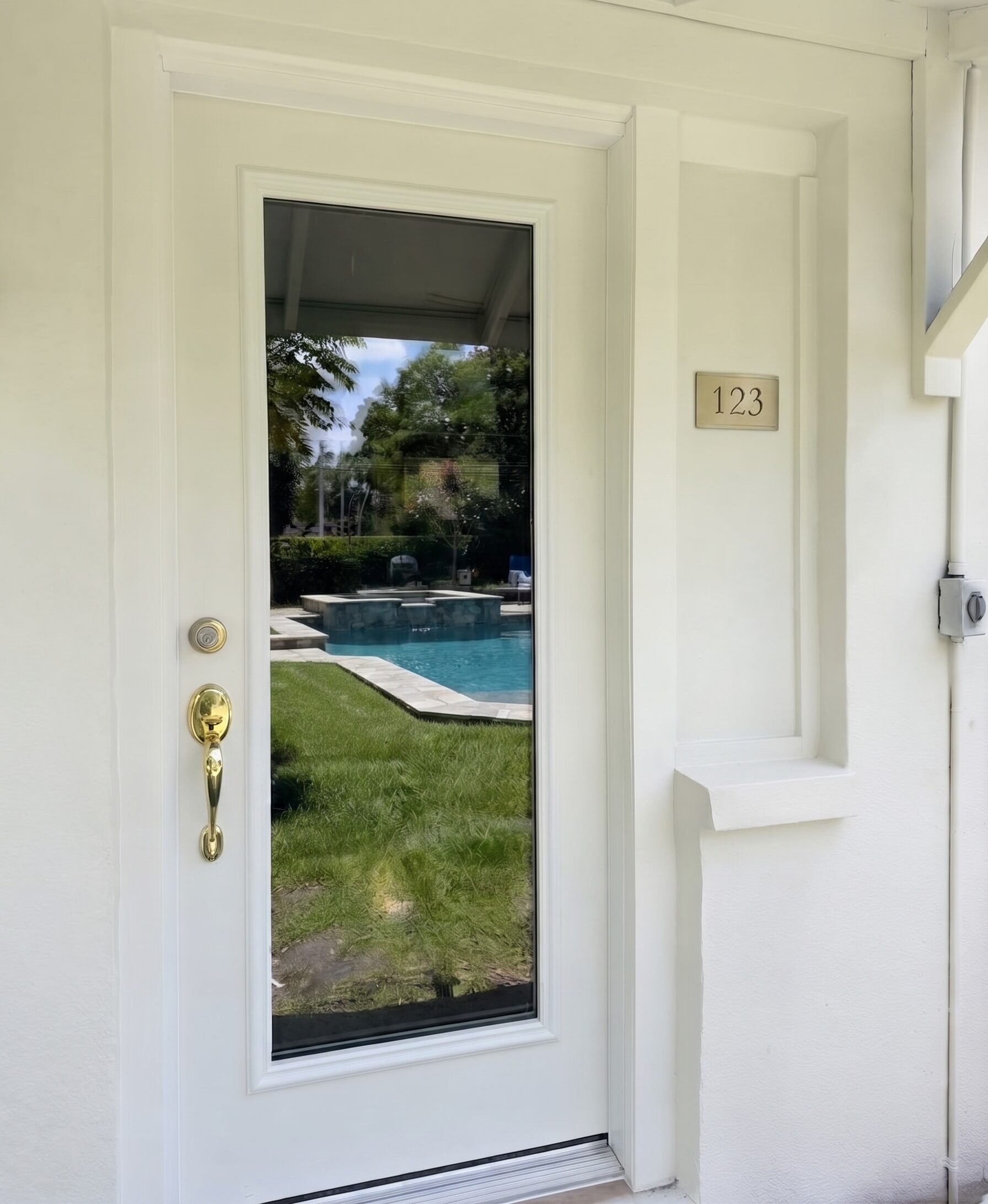 modern all white framed door with glass panel